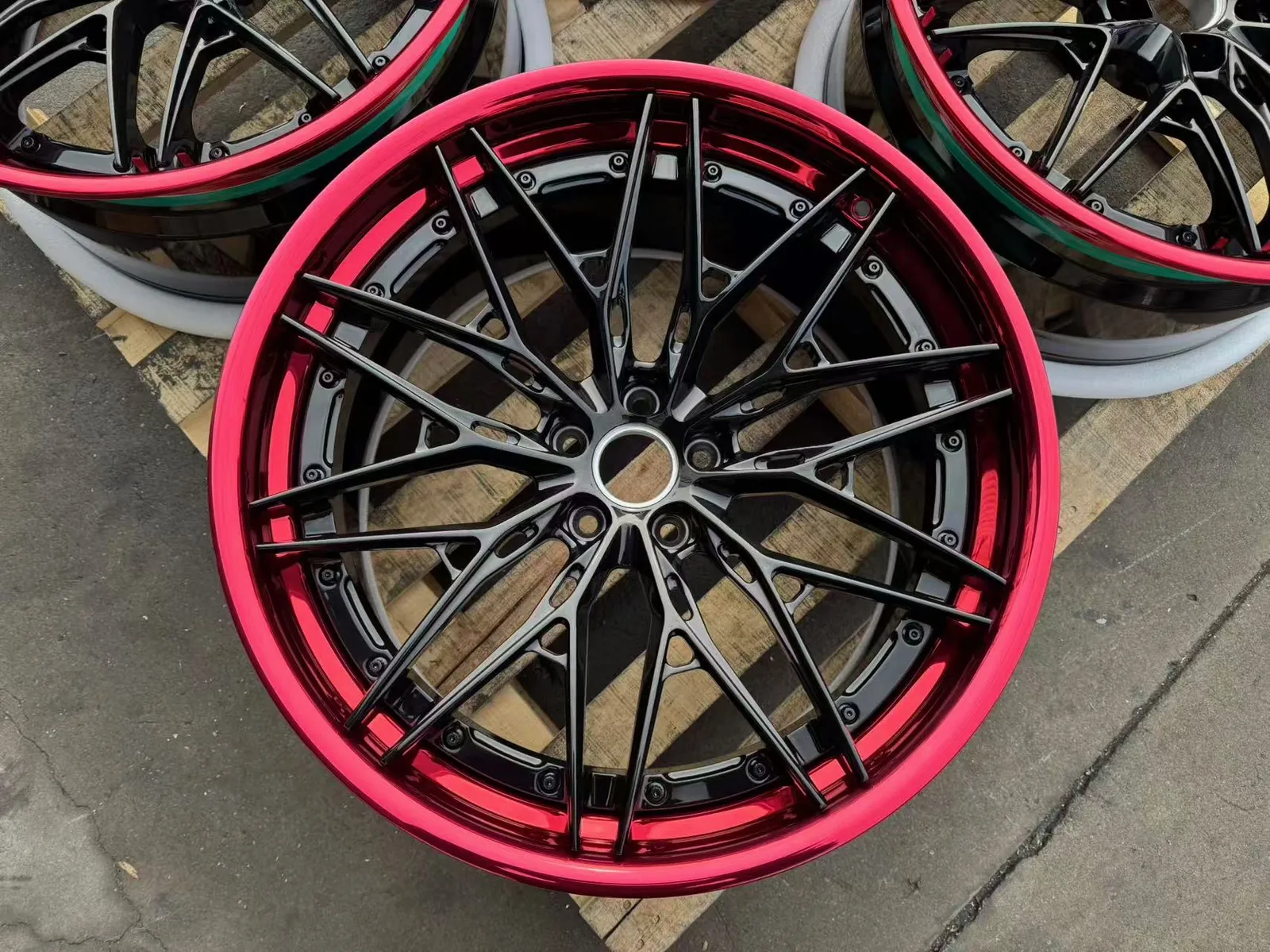 Forged wheel with red lip, fresh off the pallet
